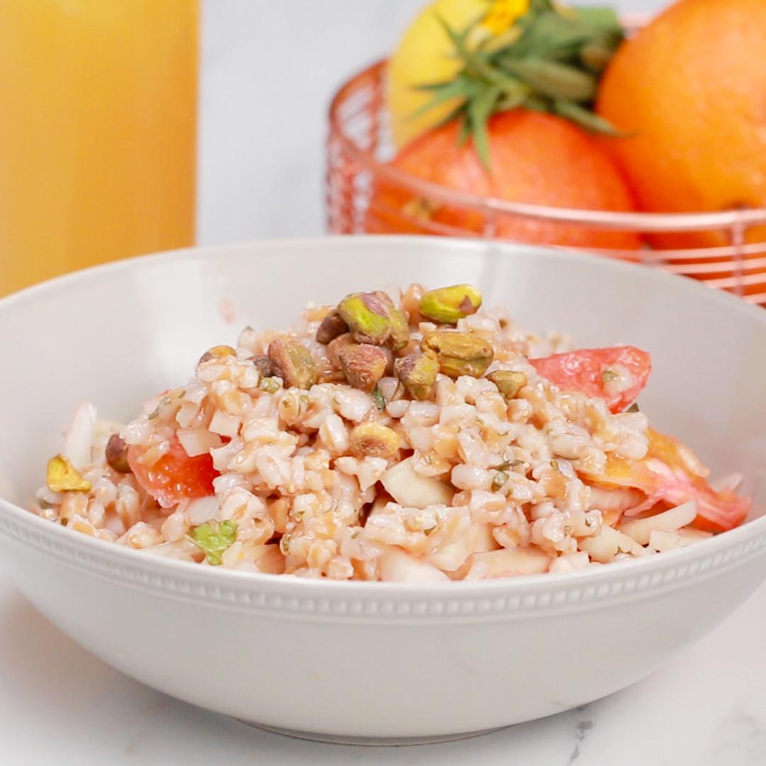 Blood oranges, grapefruit and orange slices with farro and pistachios